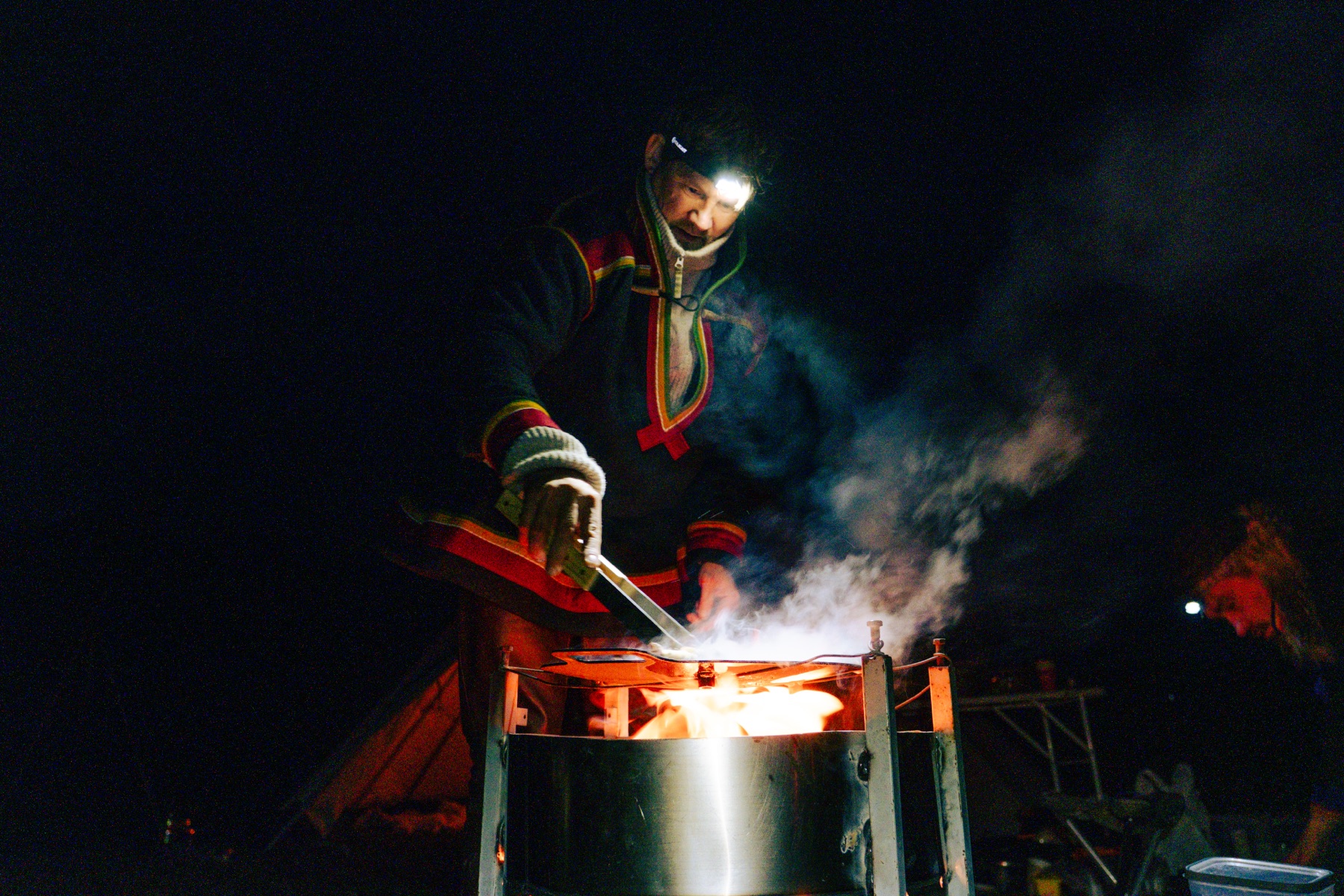 Cooking by head torch over the fire