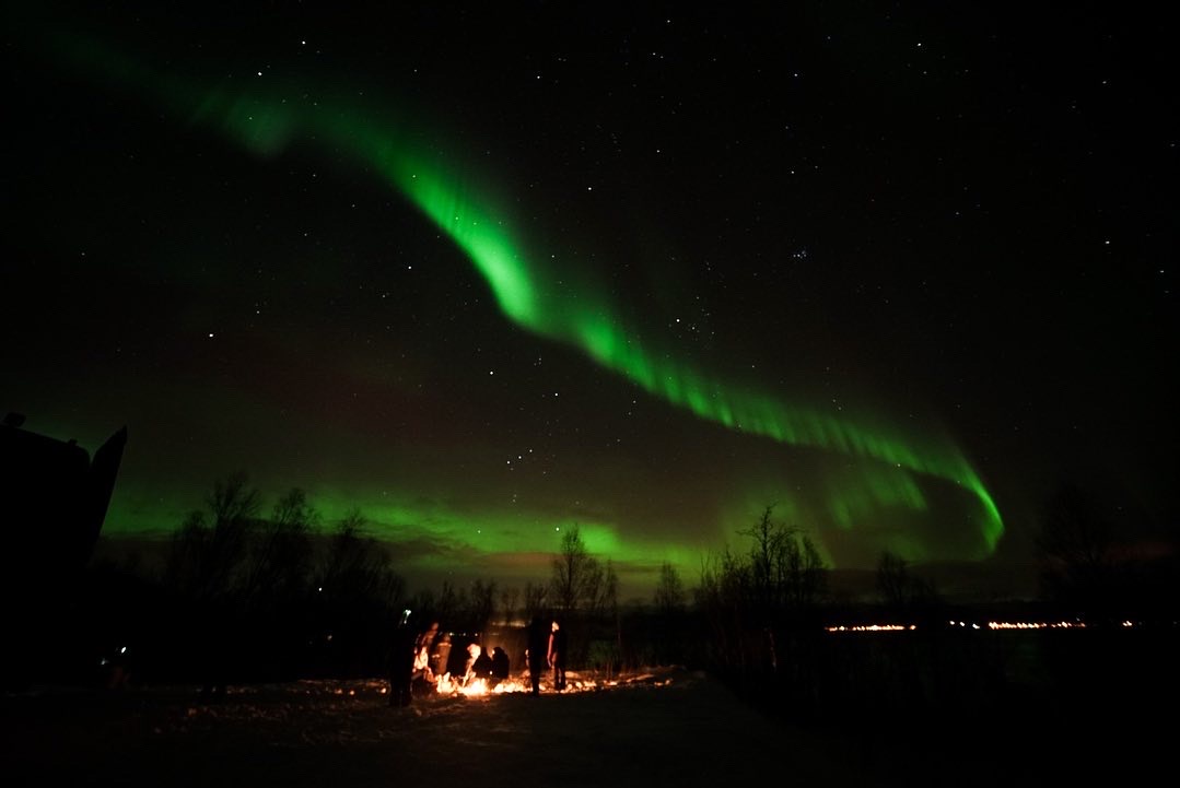 A bonfire under the northern lights